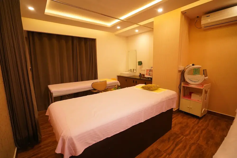 A room with a treatment bed at Hiwaga Vizag
